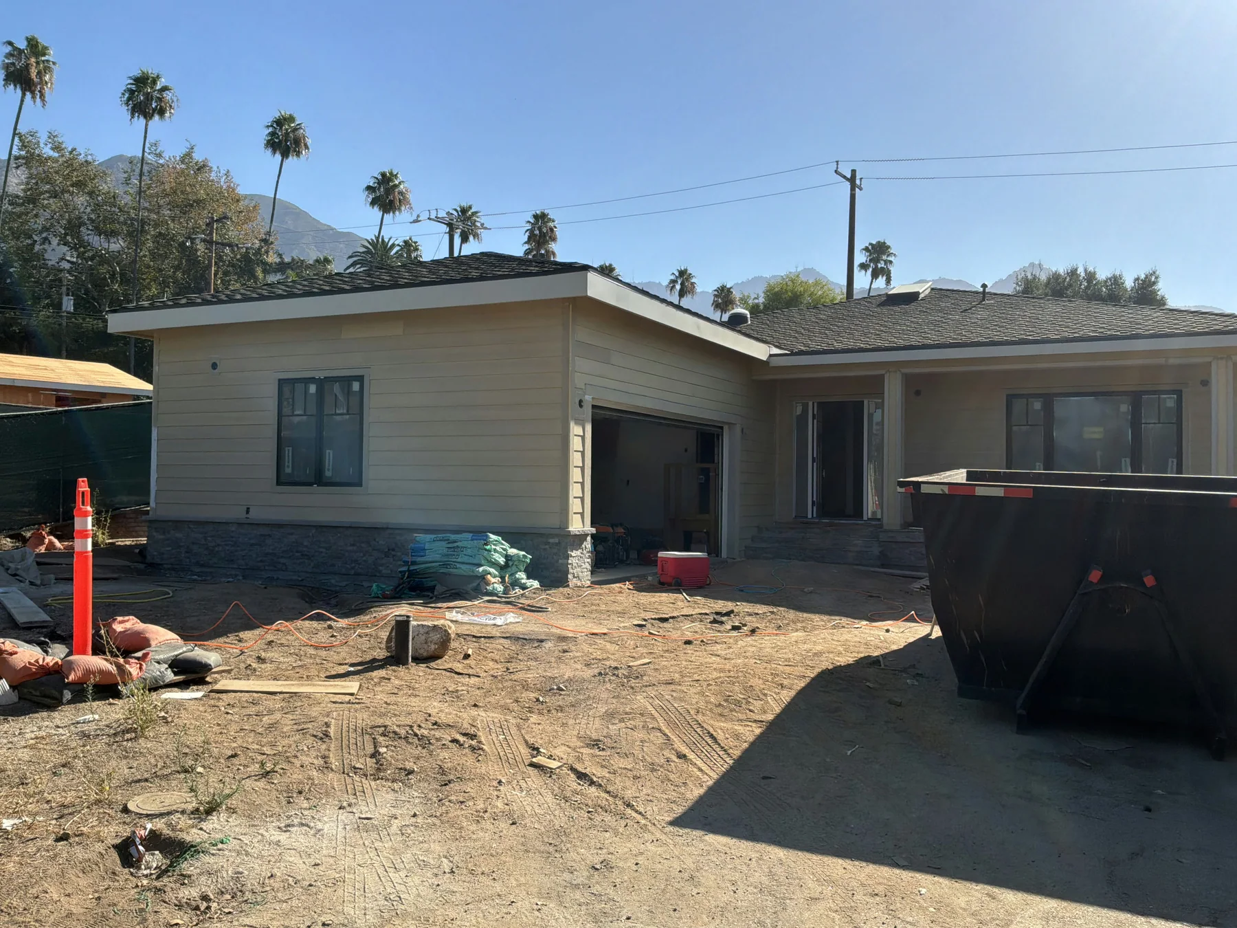Residential exterior construction in progress on an active jobsite